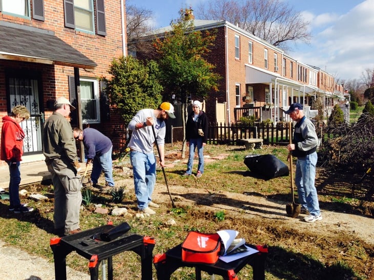 Neighbors hard at work at Marcus' house.